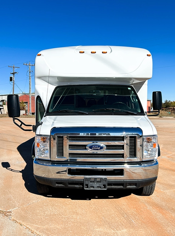 front of a white bus